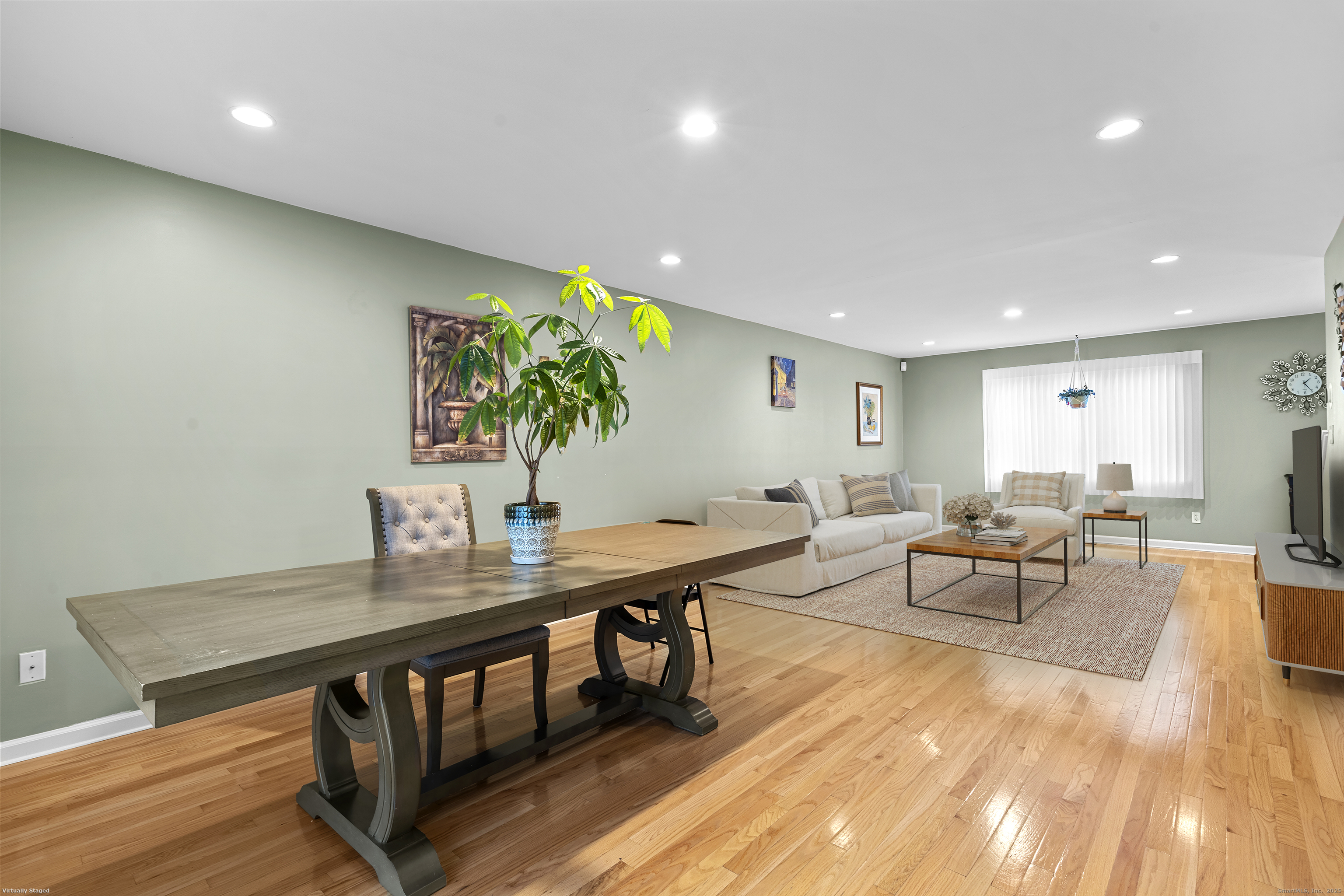 15 Derbyshire, Unit 15 Derby, CT 06418 - Photo 7 of 39 a living room with furniture and a wooden floor