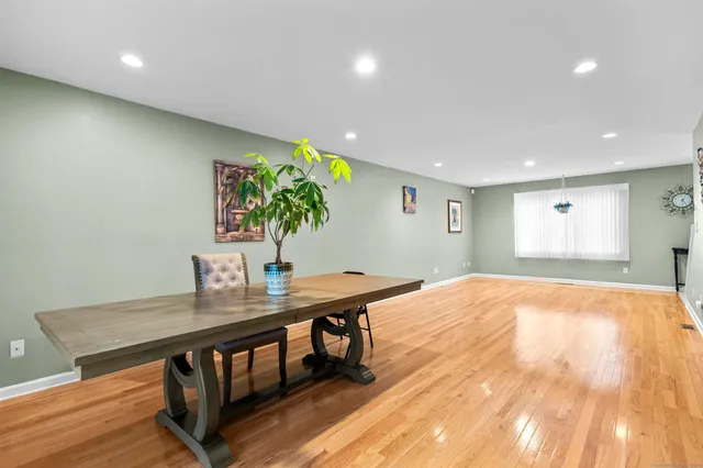 a kitchen with a stove sink and cabinets