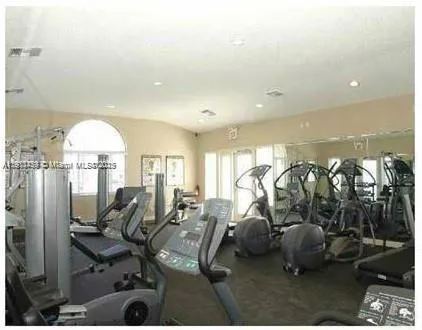 a sign that is in front of flowers