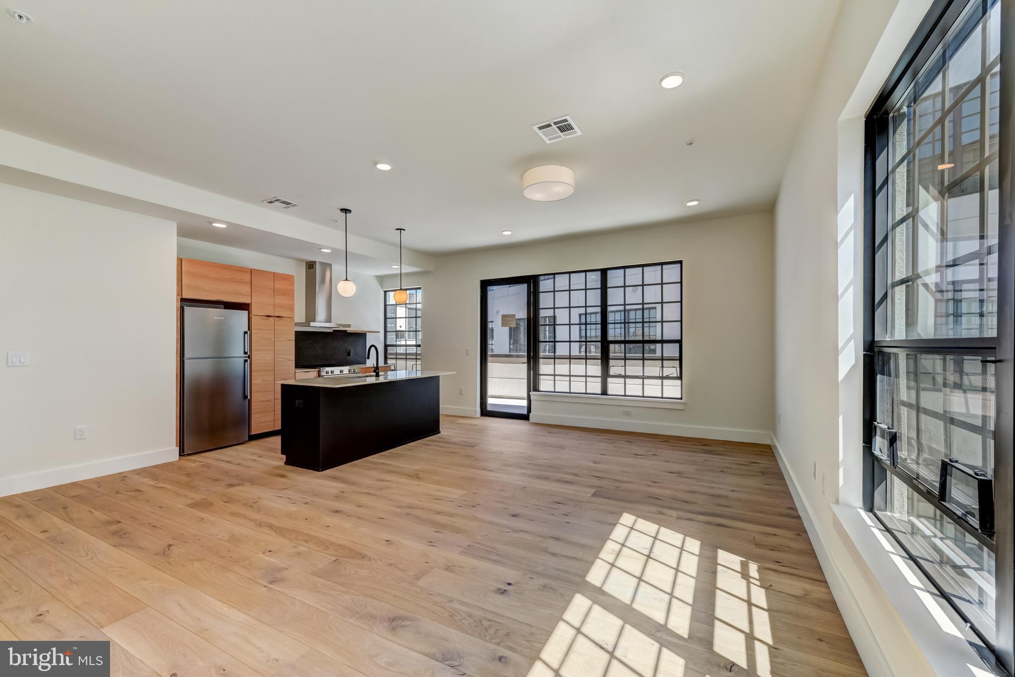 1701-15 North 2nd Street, Unit 606 Philadelphia, PA 19122 - Photo 31 of 47 a view of a kitchen with a sink and a window