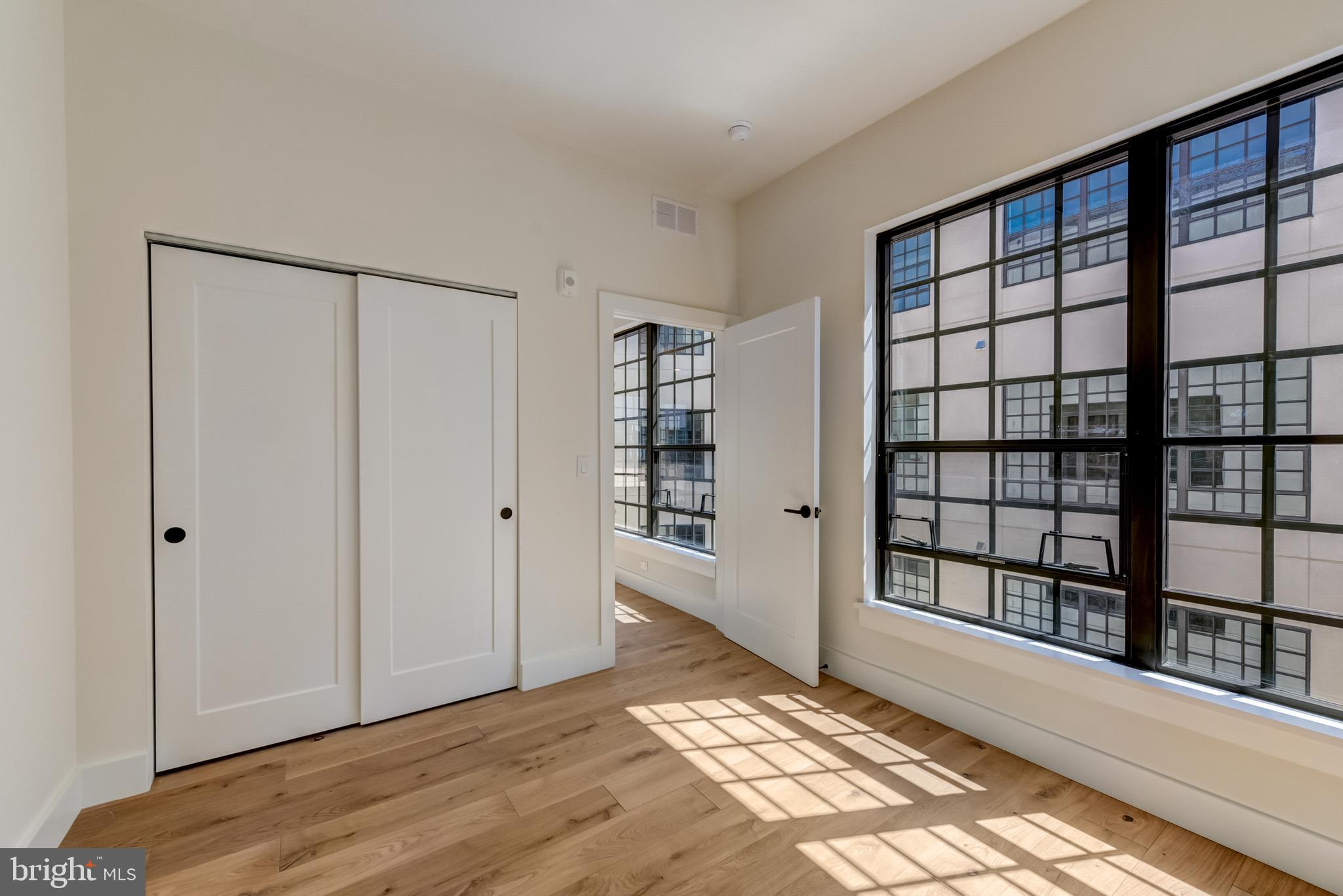 1701-15 North 2nd Street, Unit 606 Philadelphia, PA 19122 - Photo 35 of 47 a view of an empty room and window