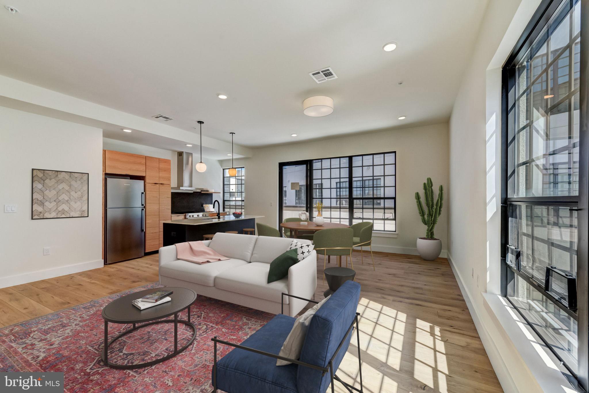 1701-15 North 2nd Street, Unit 606 Philadelphia, PA 19122 - Photo 5 of 47 a living room with furniture and a window