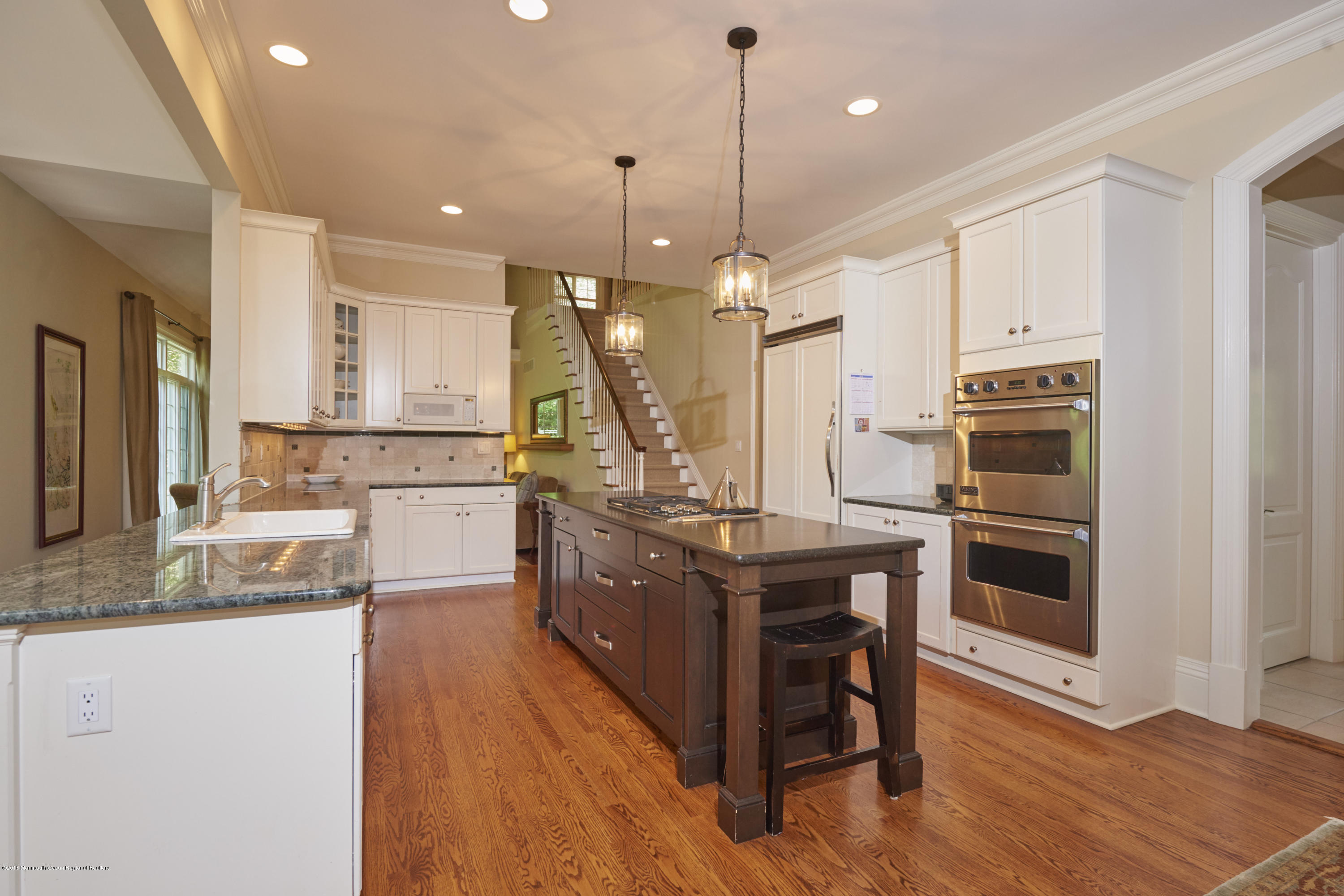 6 Willowbrook Road Rumson, NJ 07760 - Photo 11 of 33 a kitchen with stainless steel appliances granite countertop a stove a sink a oven and a refrigerator with wooden floor