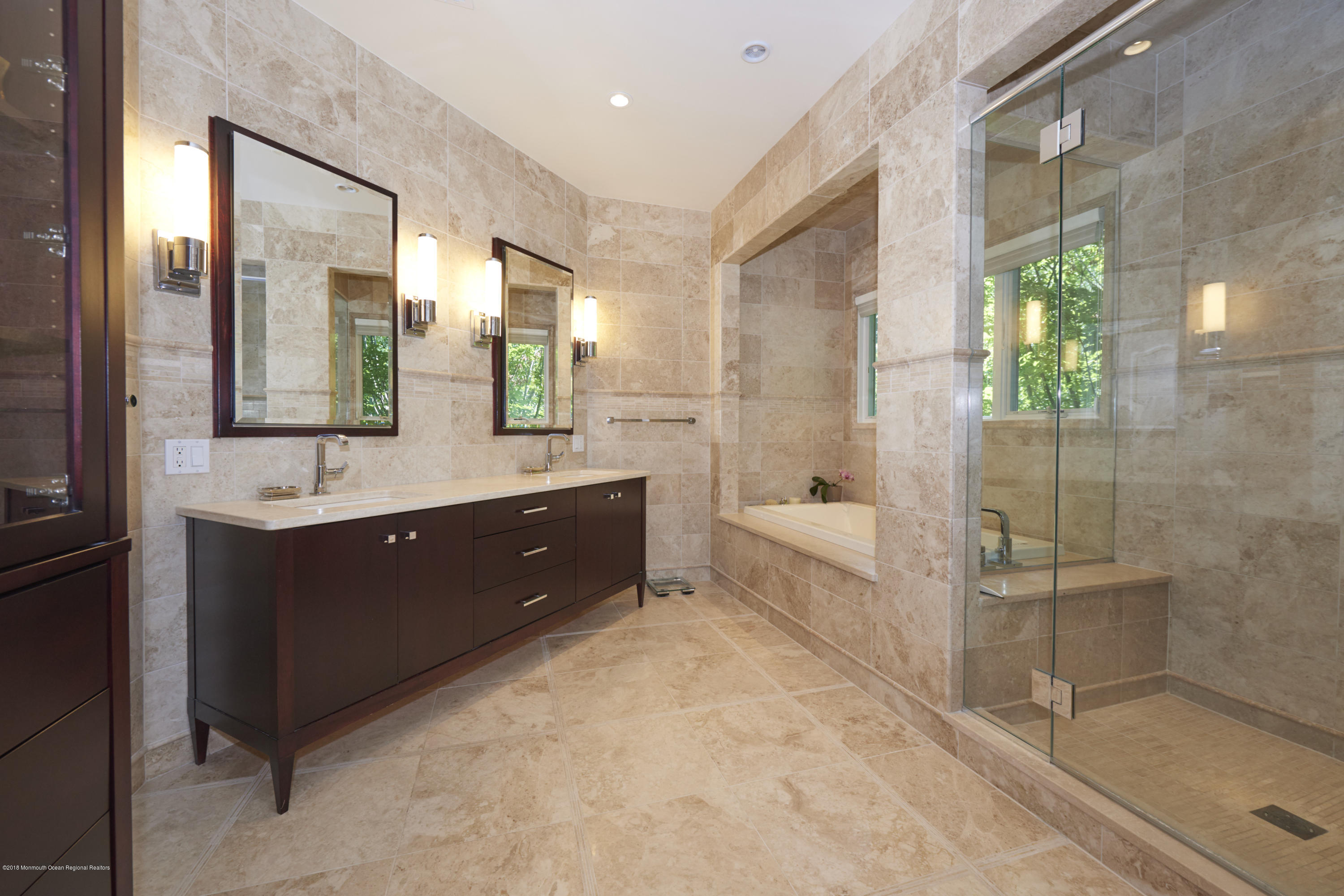 6 Willowbrook Road Rumson, NJ 07760 - Photo 23 of 33 a spacious bathroom with a tub sink shower and mirror