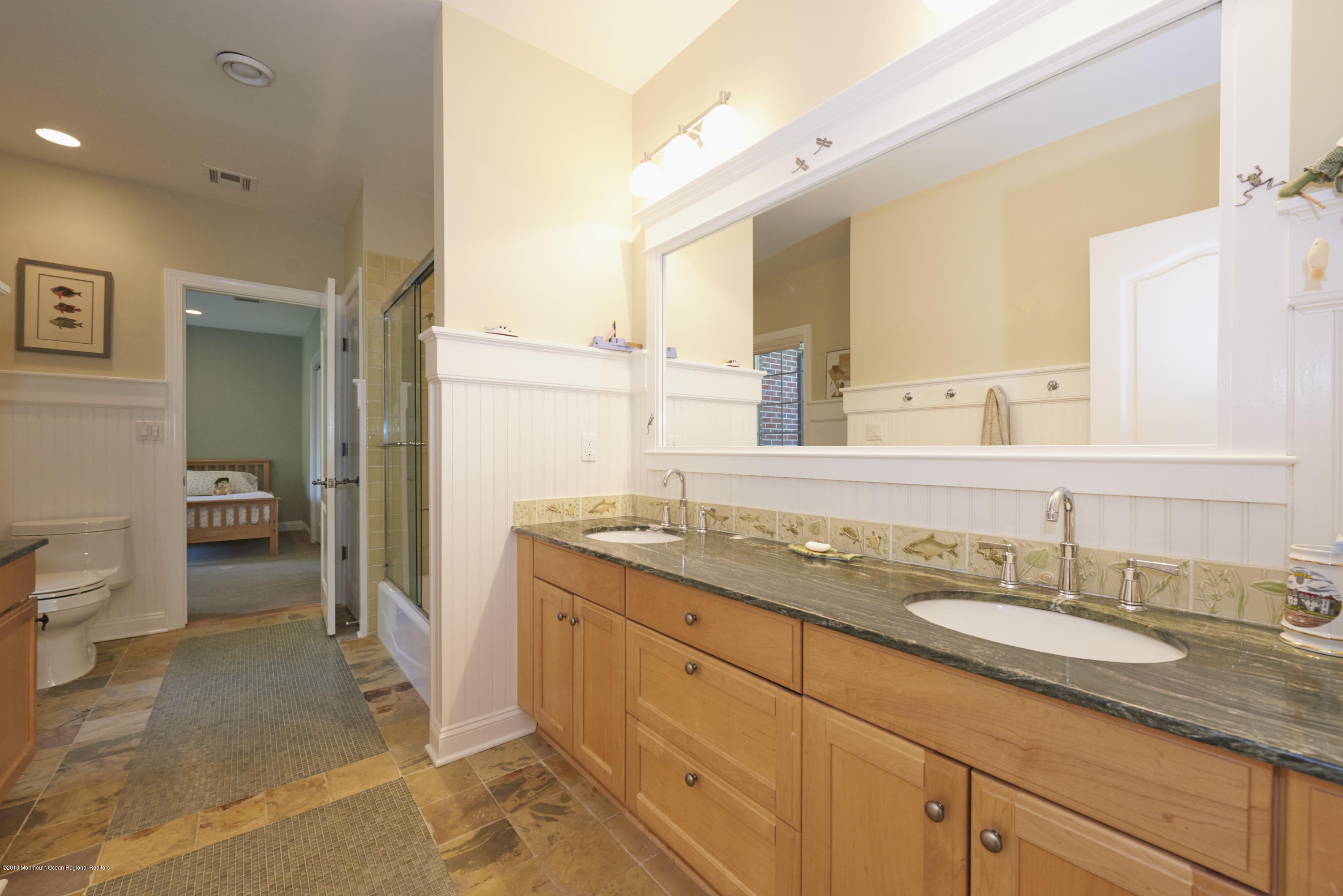 6 Willowbrook Road Rumson, NJ 07760 - Photo 26 of 33 a spacious bathroom with a granite countertop sink mirror and a toilet