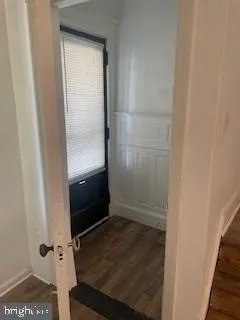 a view of a hallway view with living room