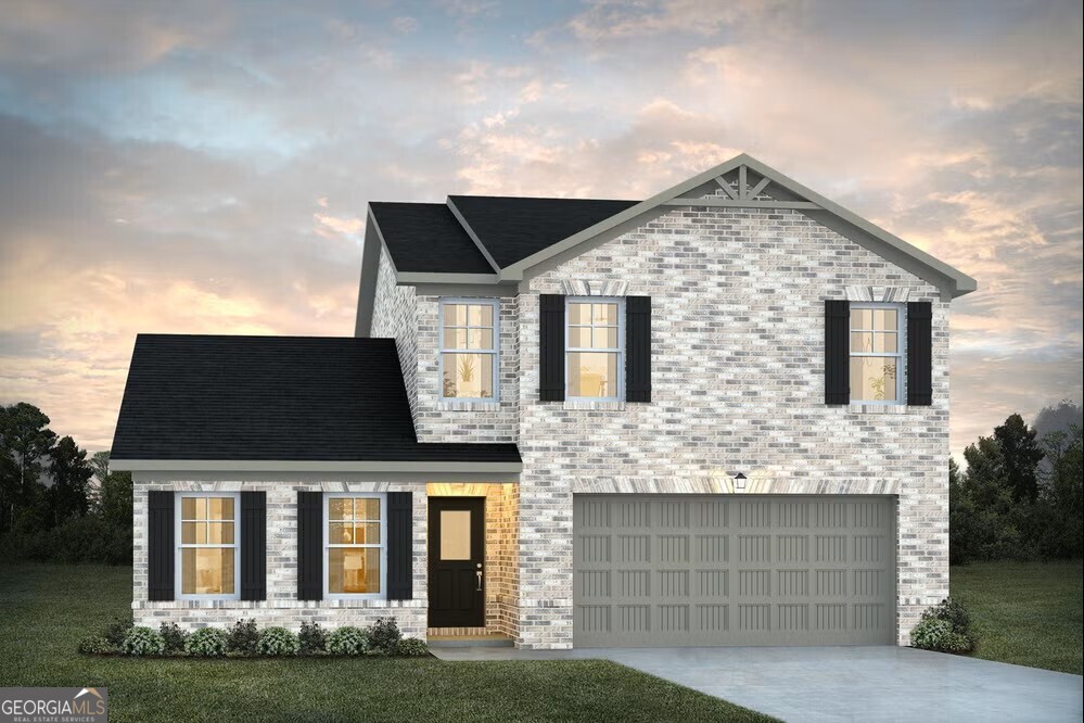 7308 Tolar Road, Unit 40 South Fulton, GA 30213 - Photo 1 of 1 a front view of a house with a garden