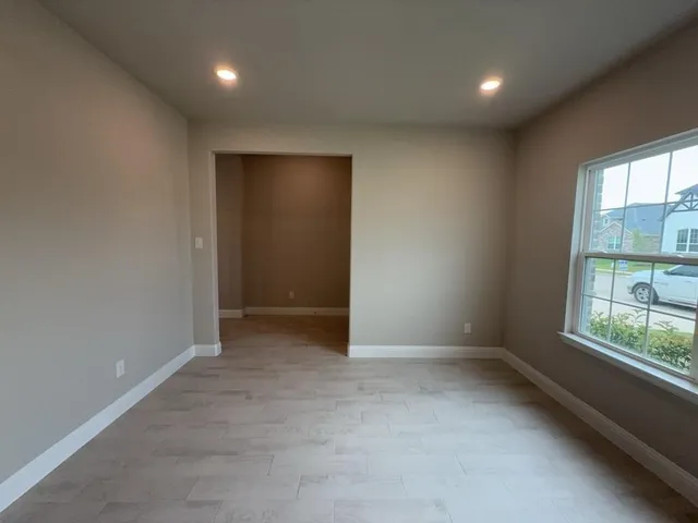 an empty room with windows