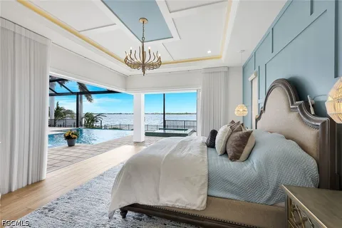 a living room with furniture kitchen view and a potted plant