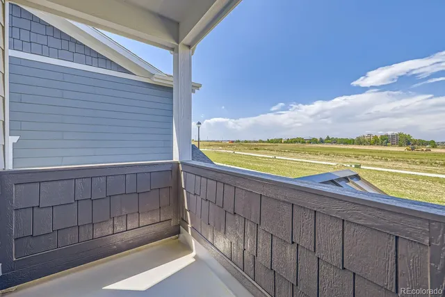 a view of a swimming pool with a lounge chair