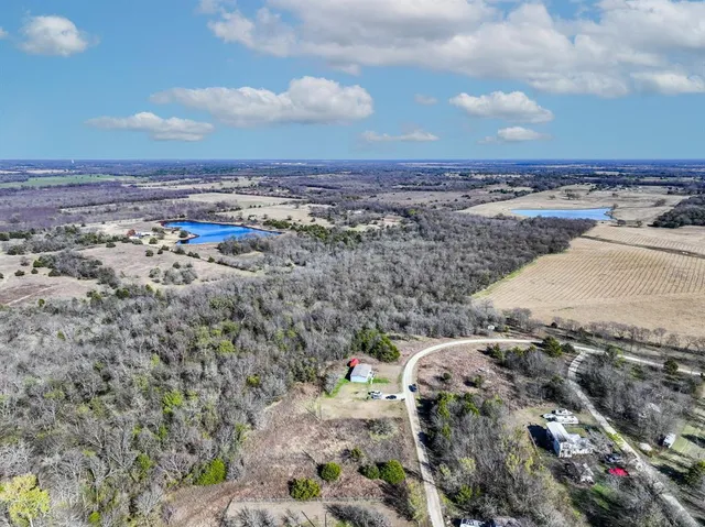 a view of dirt yard and mountain
