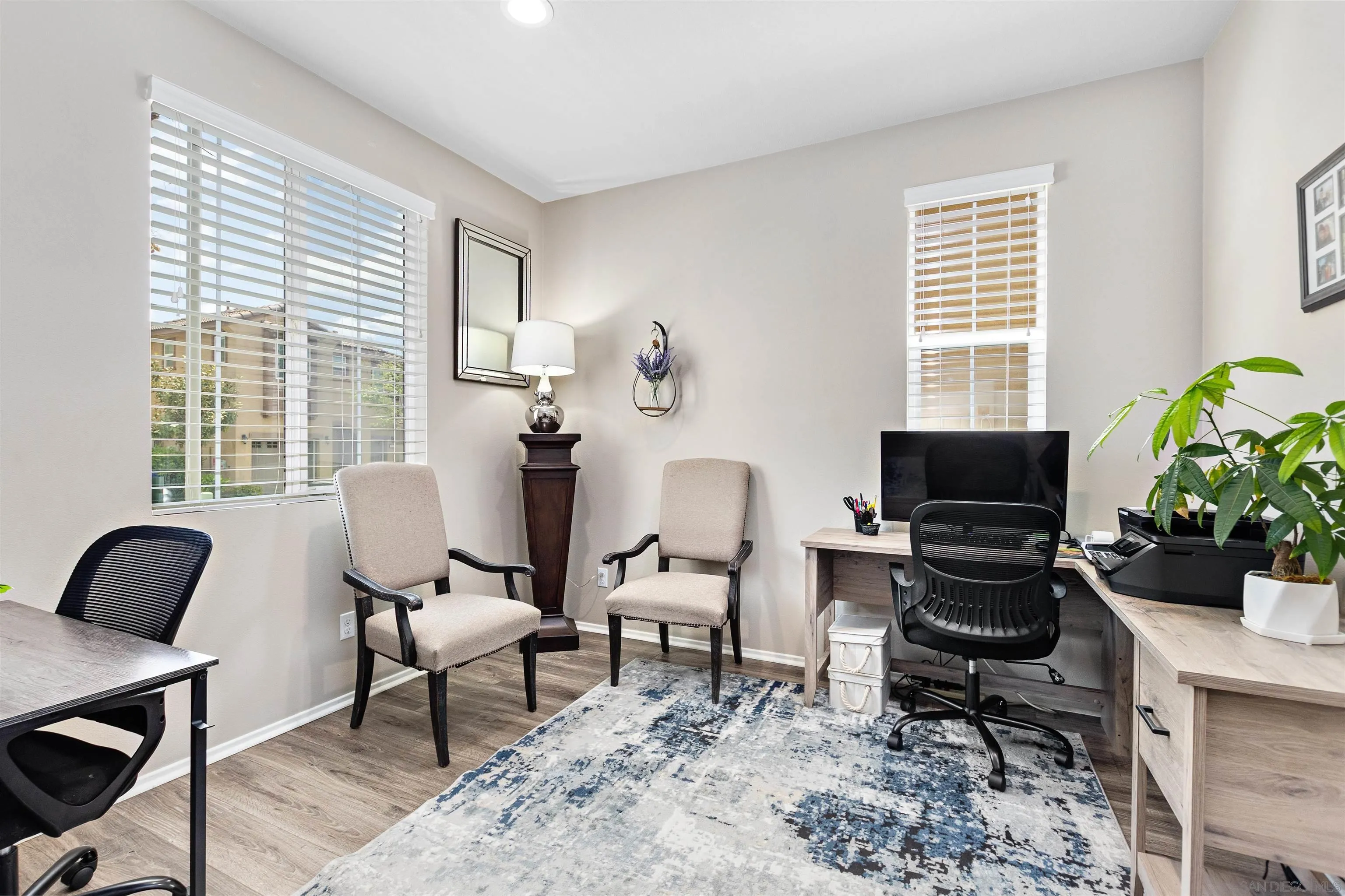 216 Oberlander Way Fallbrook, CA 92028 - Photo 11 of 31 a living room with furniture and a potted plant