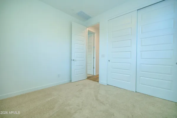 an empty room with closet