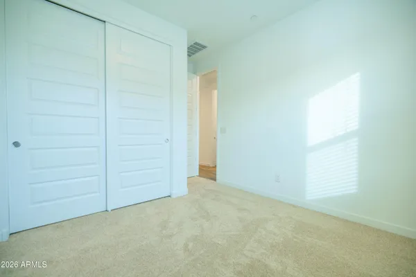 an empty room with closet