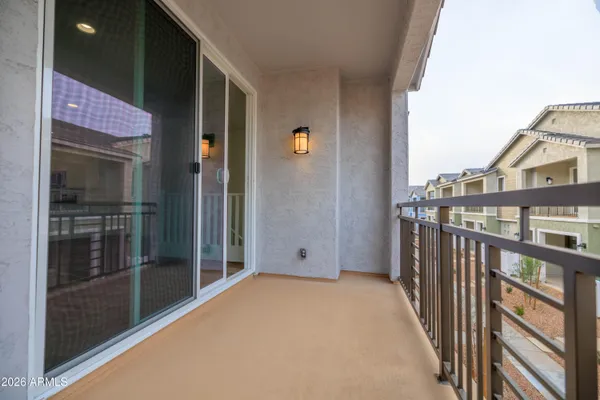 a view of a balcony with an outdoor space