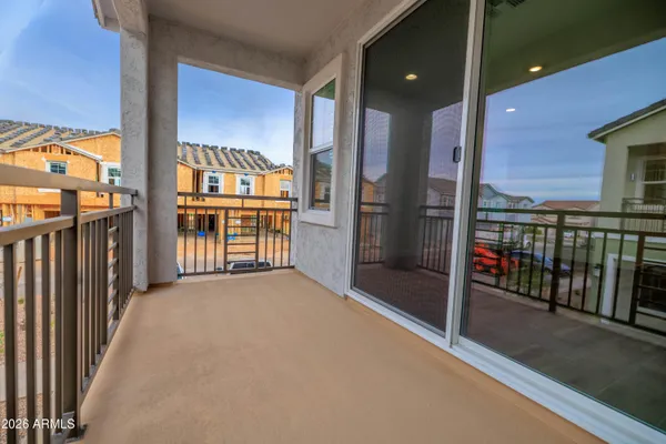 a view of a porch with seating space