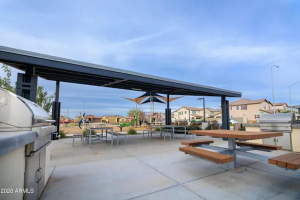 a view of a street with a building in the background
