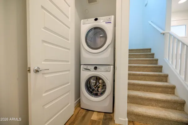 a utility room with dryer and washer