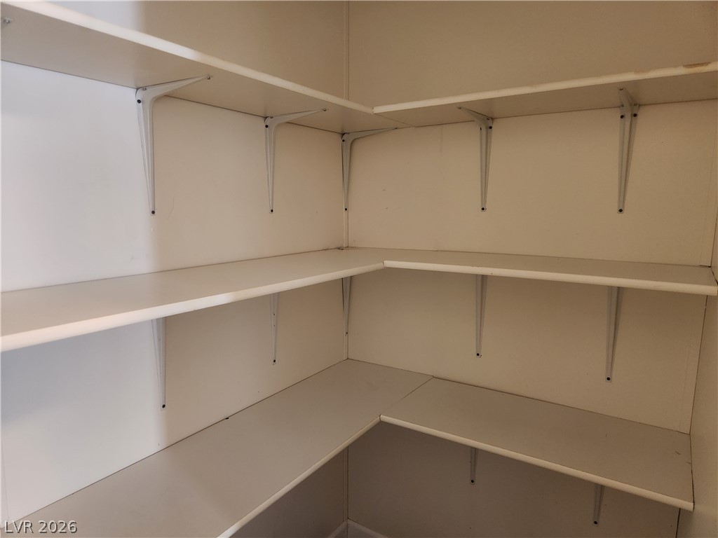 3189 Del Monte Street Laughlin, NV 89029 - Photo 11 of 32 Ample shelving in this well-organized storage space offers exceptional utility.