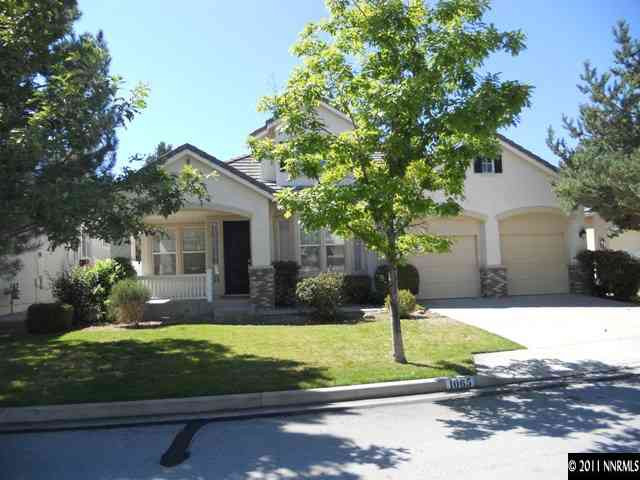 1065 Greenwich Way Reno, NV 89519 - Photo 1 of 13 a front view of a house with garden