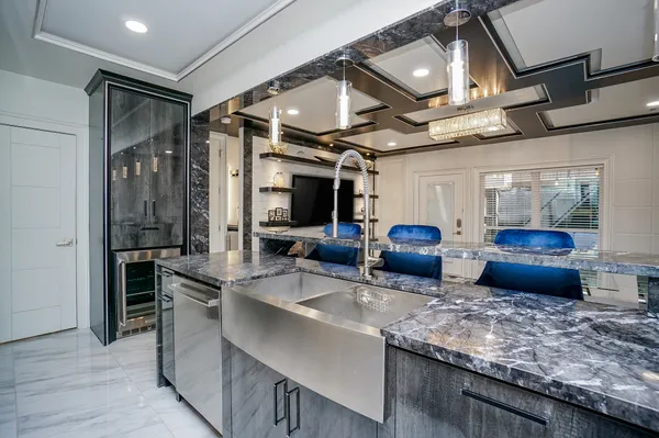 a kitchen with granite countertop lots of counter top space