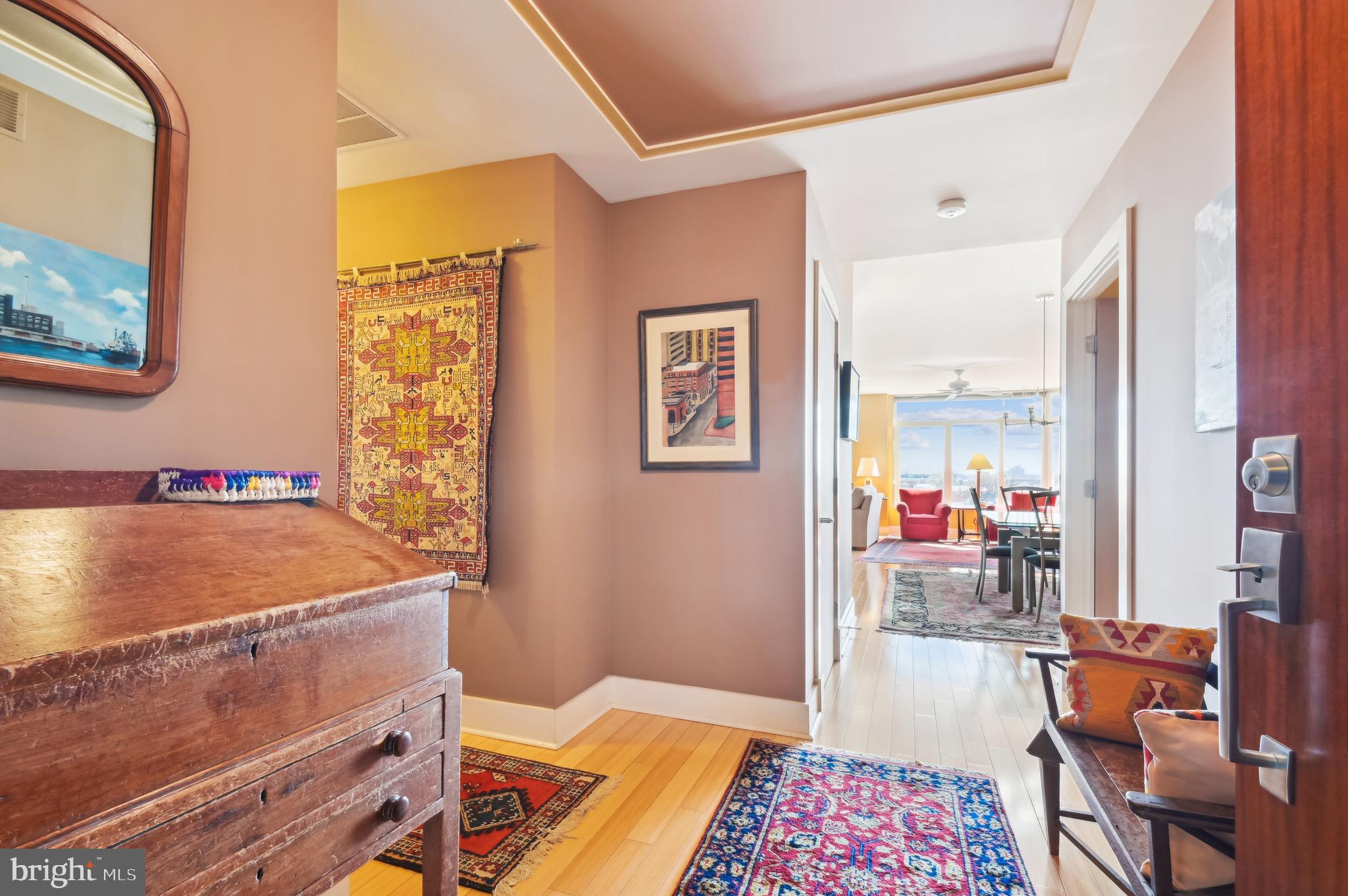 1400 Lancaster Street, Unit 605 Baltimore, MD 21231 - Photo 20 of 44 a room with furniture and a table