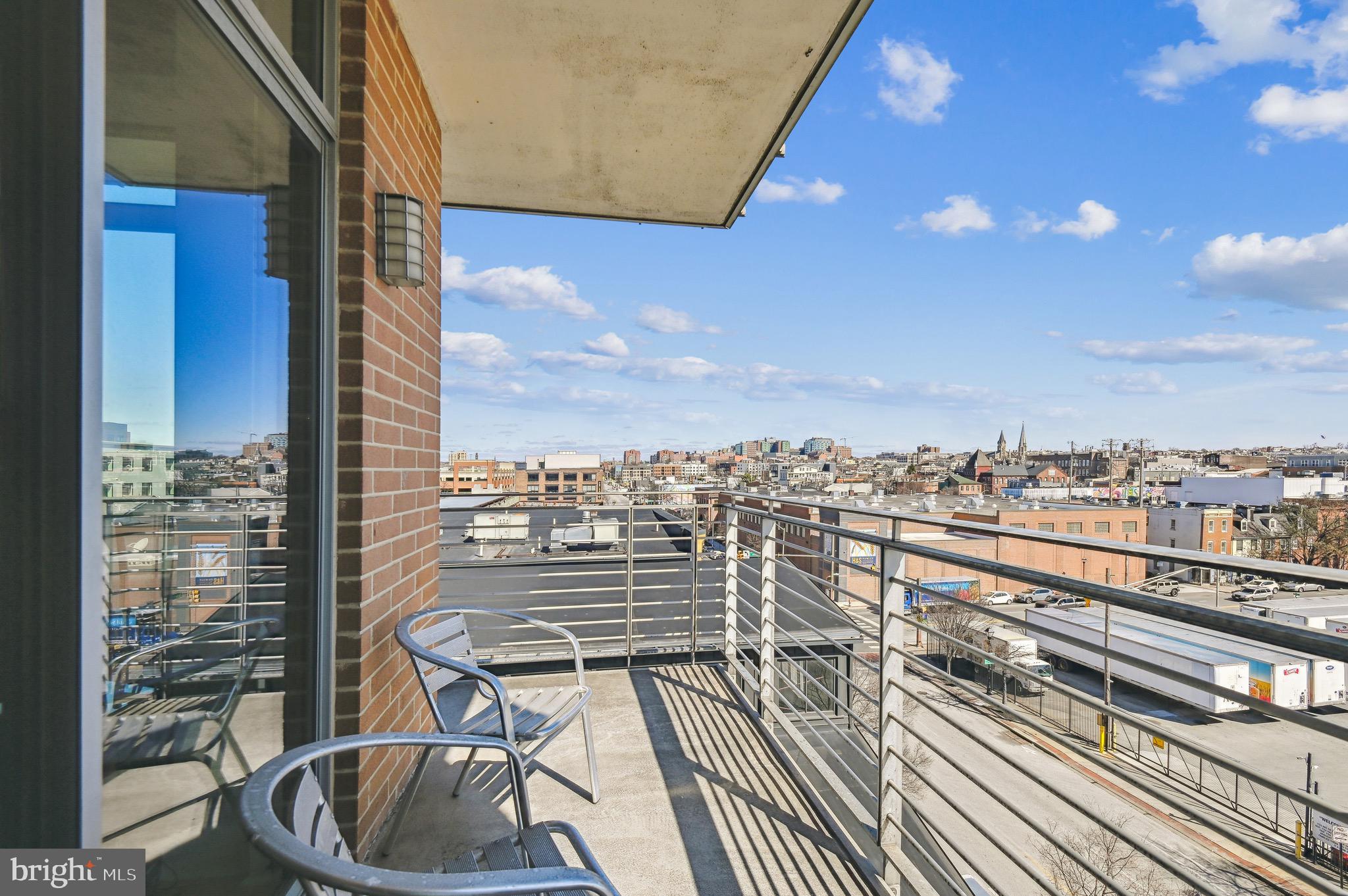 1400 Lancaster Street, Unit 605 Baltimore, MD 21231 - Photo 2 of 44 a view of a balcony with city view