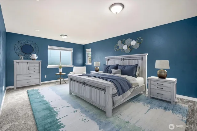 a bedroom with a bed and a dresser