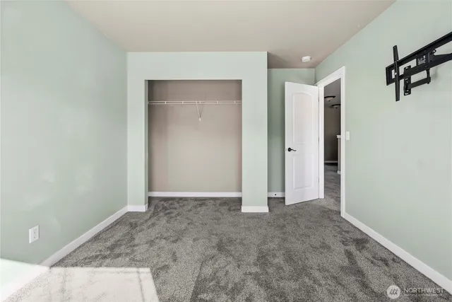 an empty room with closet