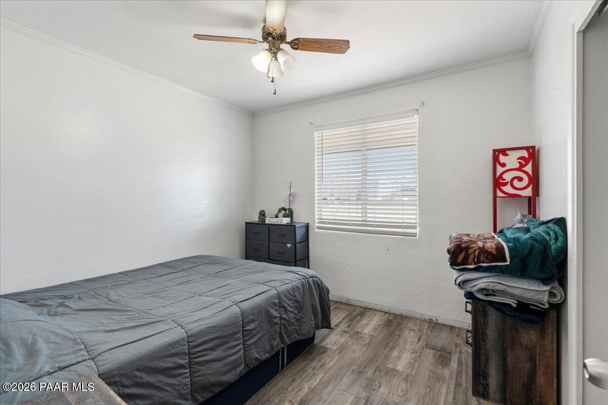 46812 8th Street Ash Fork, AZ 86320 - Photo 16 of 26 a bedroom with a bed and a window