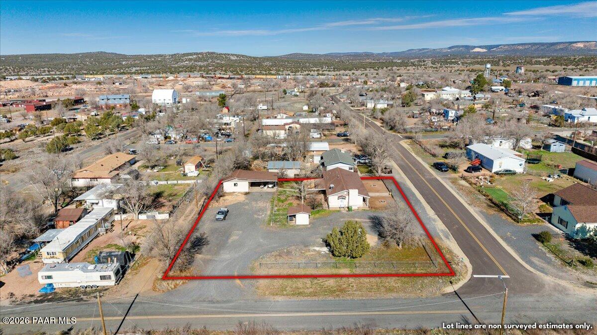 46812 8th Street Ash Fork, AZ 86320 - Photo 24 of 26 an aerial view of residential houses with outdoor space