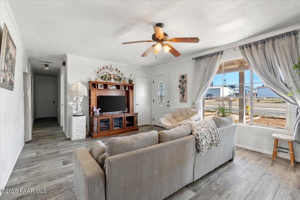 46812 8th Street Ash Fork, AZ 86320 - Photo 4 of 26 a living room with furniture and a flat screen tv