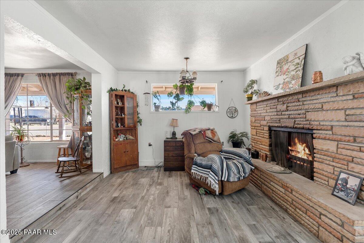 46812 8th Street Ash Fork, AZ 86320 - Photo 7 of 26 a living room with furniture and a fireplace