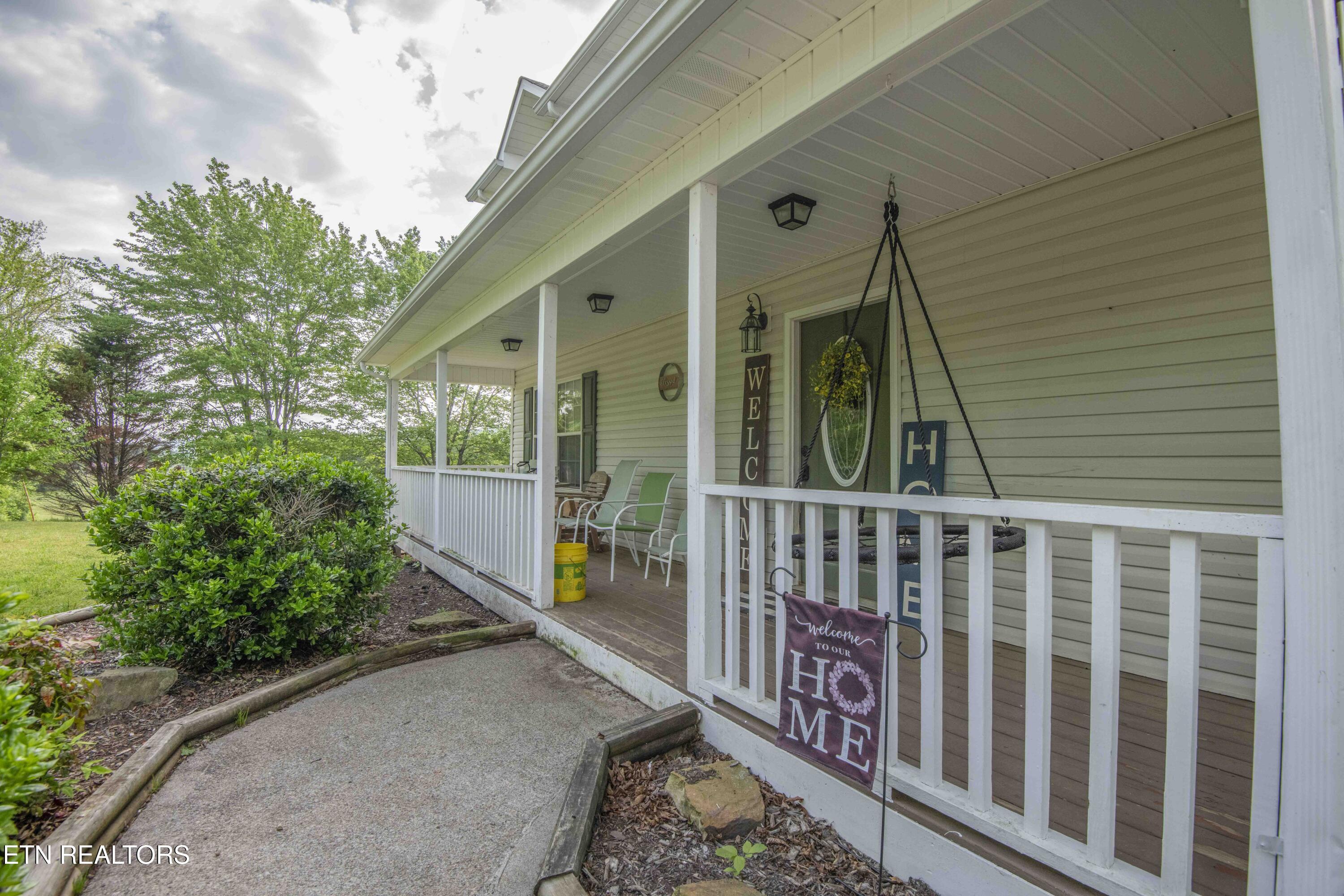 469 Old Dutch Valley Road Clinton, TN 37716 - Photo 4 of 47 porch 1_1