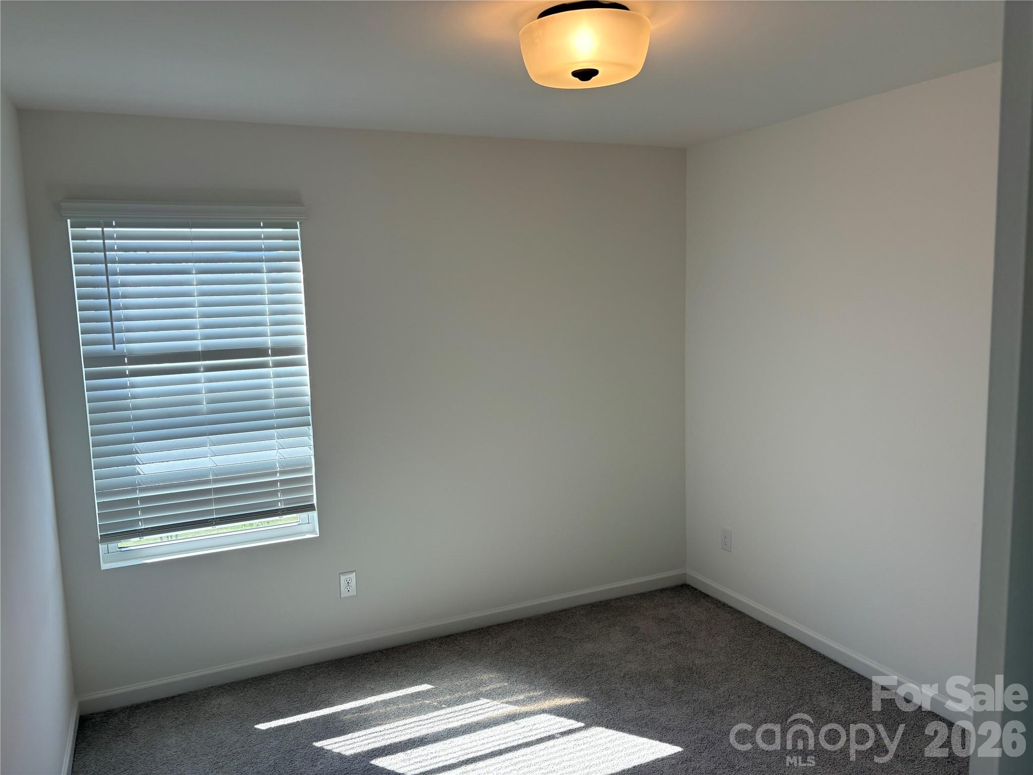 514 Station Street Clover, SC 29710 - Photo 11 of 17 an empty room with windows