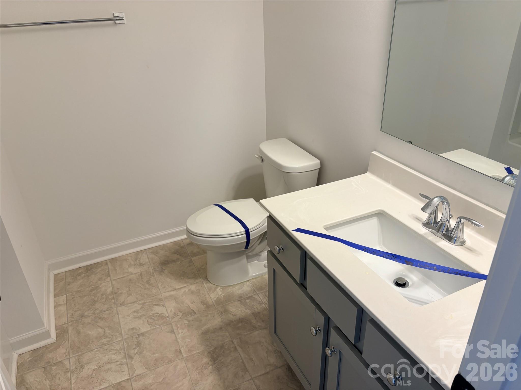 514 Station Street Clover, SC 29710 - Photo 15 of 17 a bathroom with a sink a toilet and a mirror
