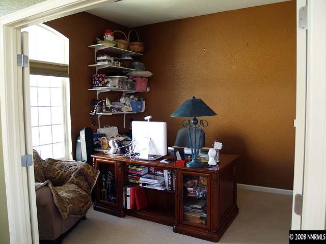 1725 Big Boulder Court Reno, NV 89521 - Photo 7 of 9 a room with furniture and wooden floor