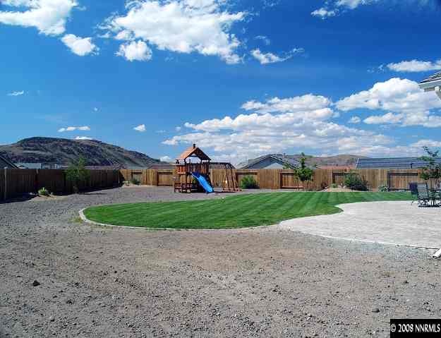 1725 Big Boulder Court Reno, NV 89521 - Photo 9 of 9 a view of a street with a house in the background
