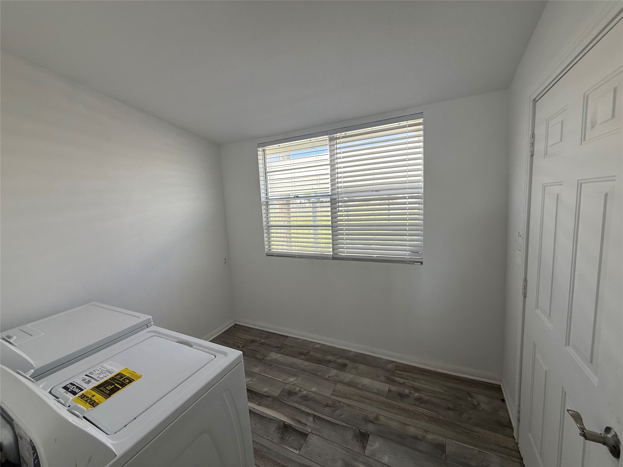 642 5th Street San Leon, TX 77539 - Photo 6 of 10 a room with storage and utility