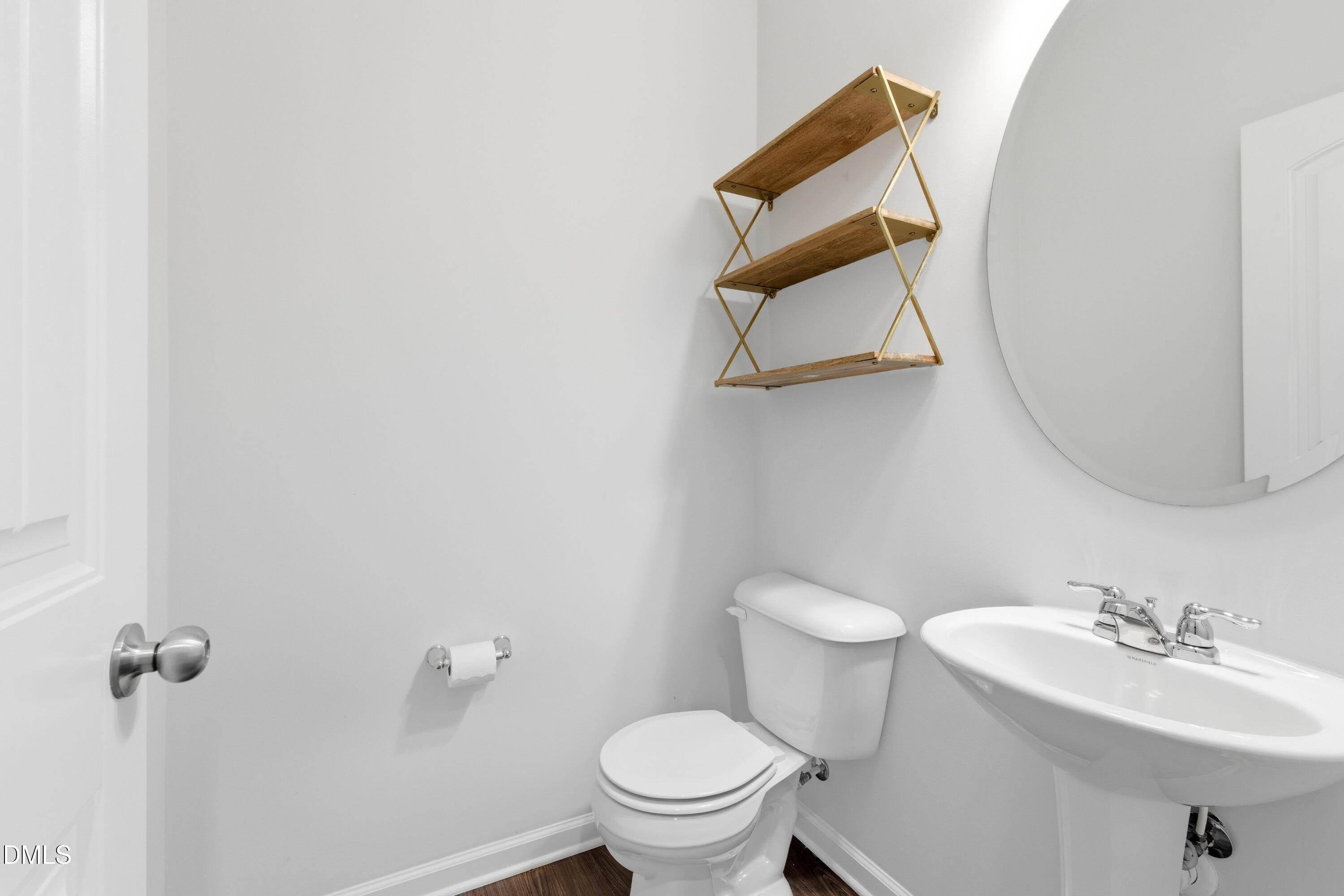 1044 Flagler Street Durham, NC 27713 - Photo 15 of 33 a bathroom with a sink mirror and toilet