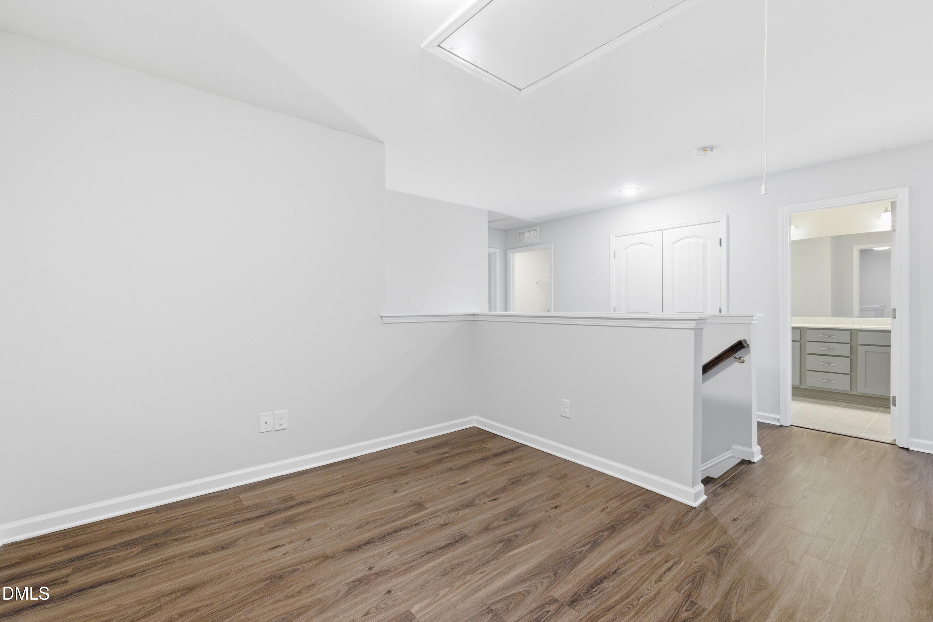 1044 Flagler Street Durham, NC 27713 - Photo 18 of 33 a view of a kitchen with wooden floor and a refrigerator