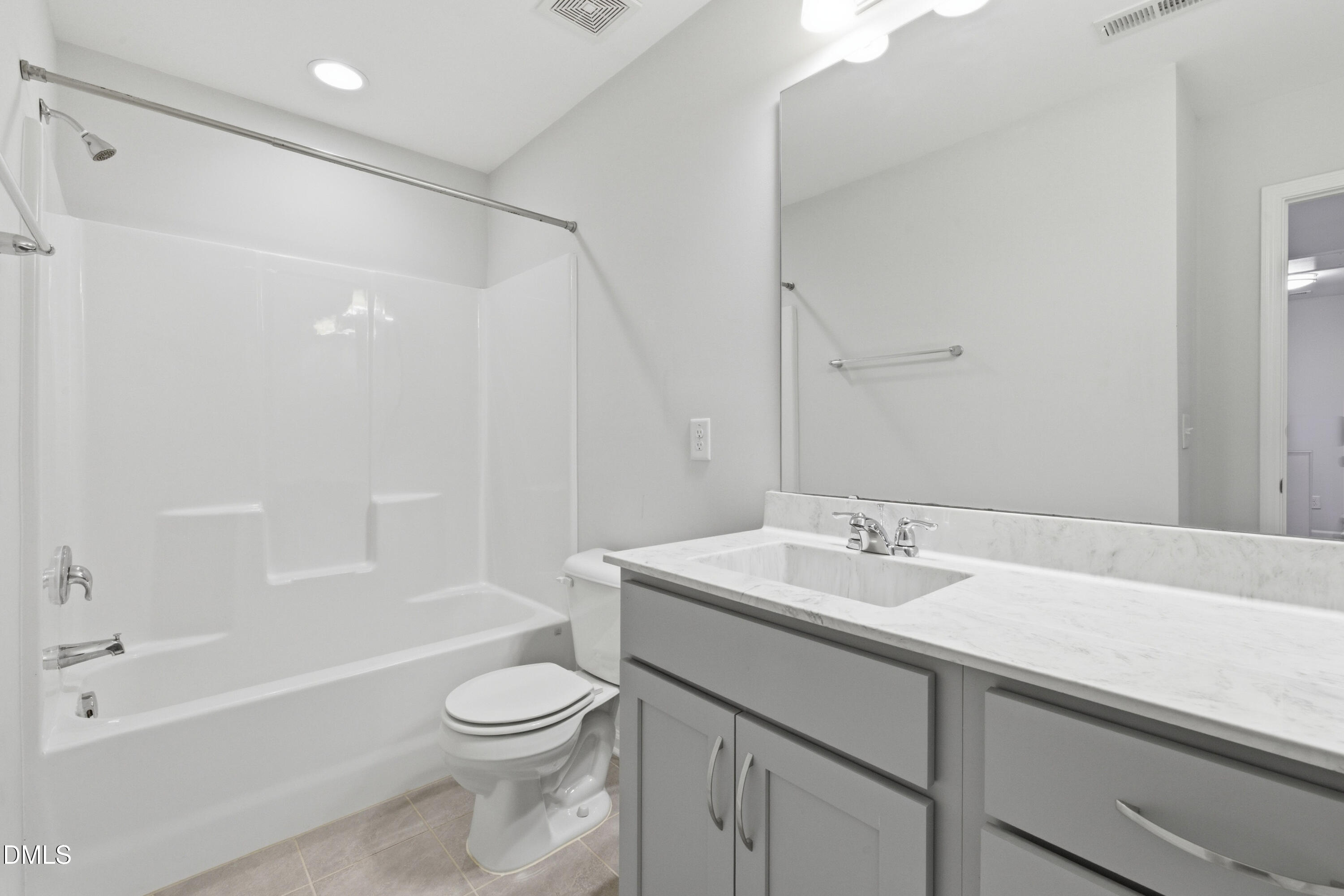 1044 Flagler Street Durham, NC 27713 - Photo 21 of 33 a bathroom with a sink a toilet and a bathtub
