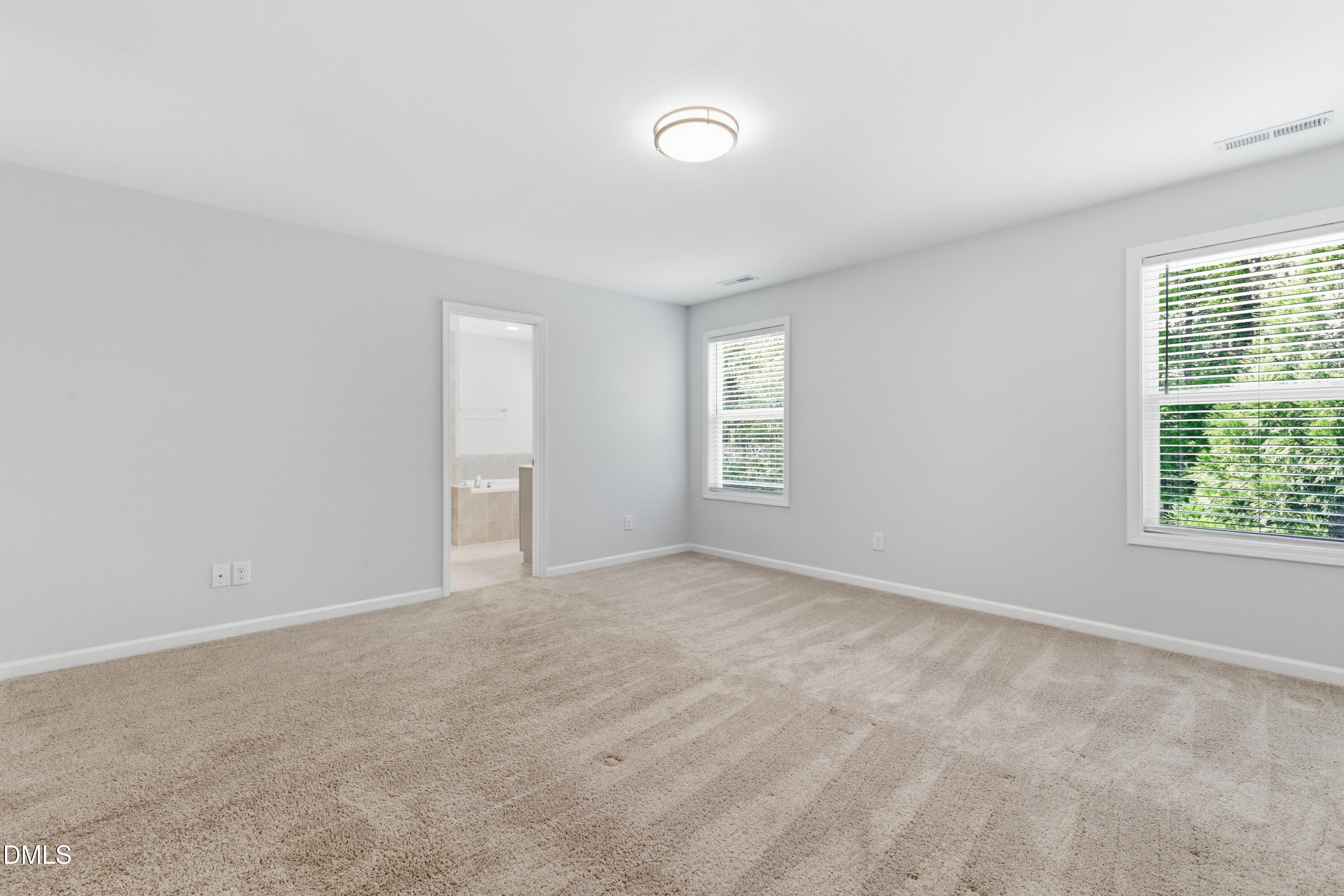 1044 Flagler Street Durham, NC 27713 - Photo 25 of 33 a view of an empty room with a window