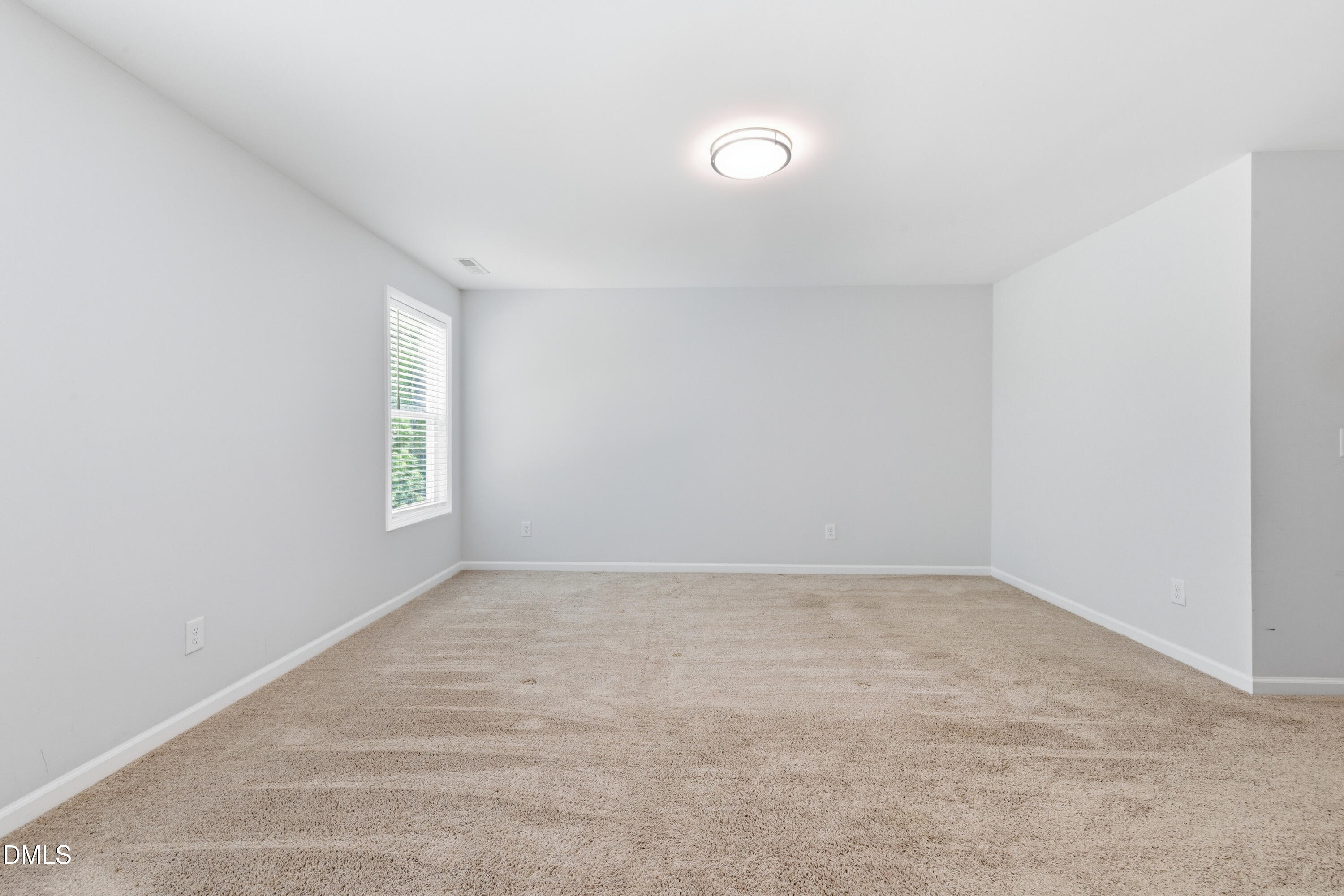 1044 Flagler Street Durham, NC 27713 - Photo 26 of 33 an empty room with windows