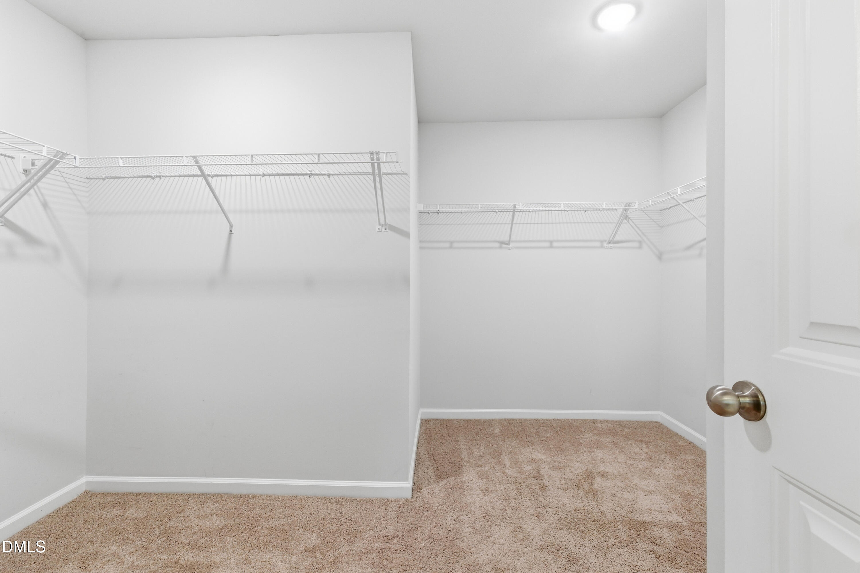 1044 Flagler Street Durham, NC 27713 - Photo 30 of 33 a view of a room with racks on the wall