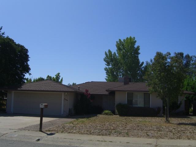 4185 Meander Drive Redding, CA 96001 - Photo 1 of 1 a front view of a house with a yard
