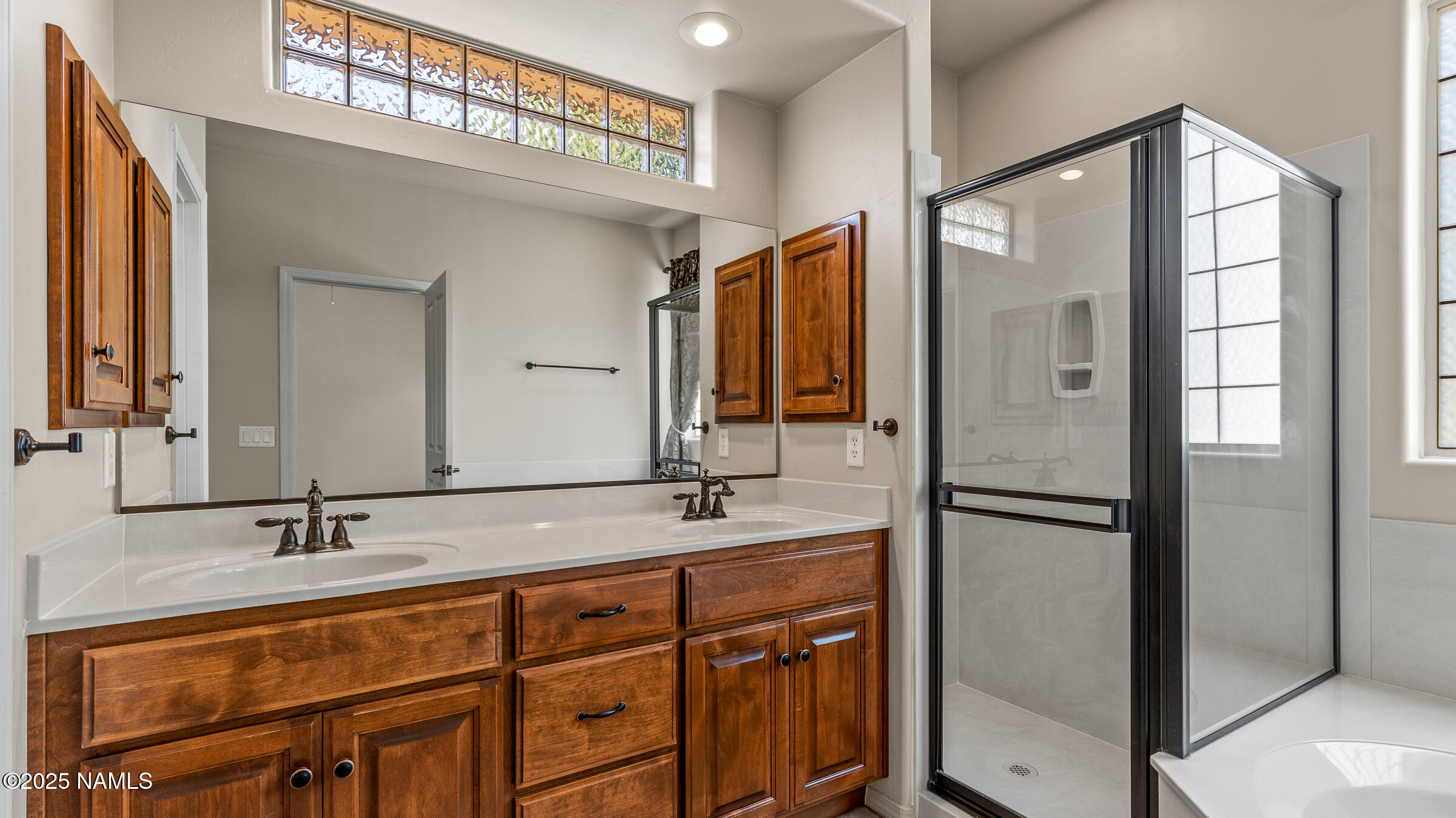 620 Brookline Loop Williams, AZ 86046 - Photo 12 of 38 a bathroom with a double vanity sink mirror and double