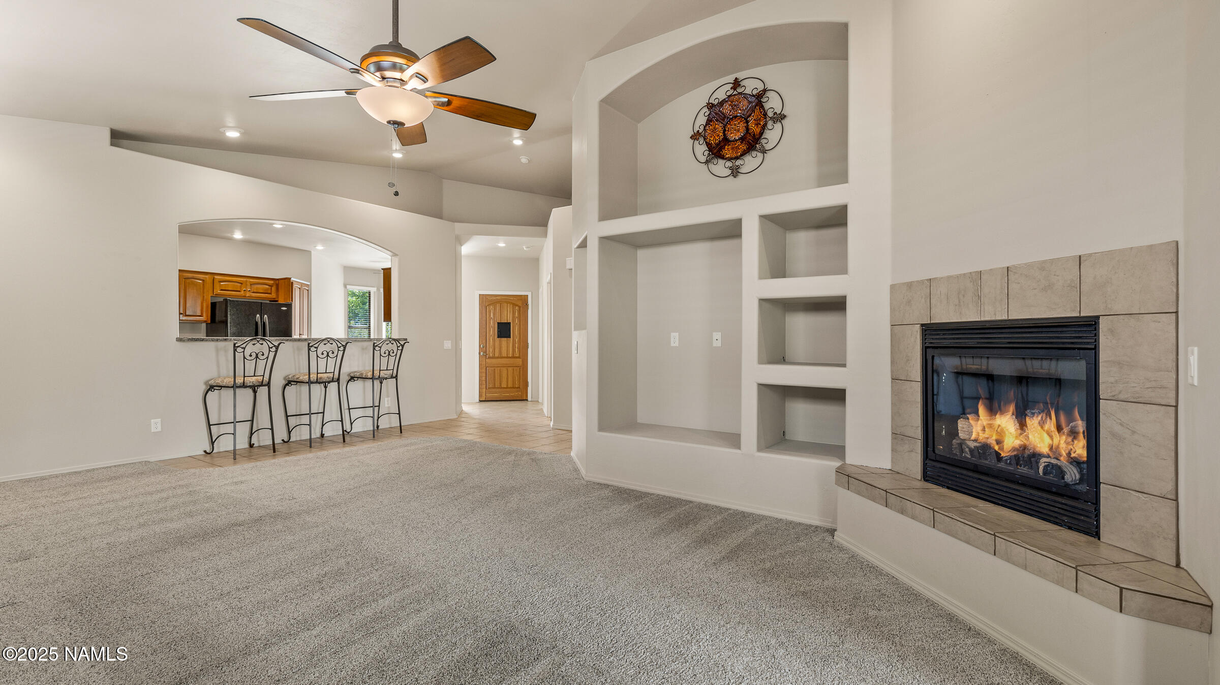 620 Brookline Loop Williams, AZ 86046 - Photo 2 of 38 a view of an empty room with a fireplace