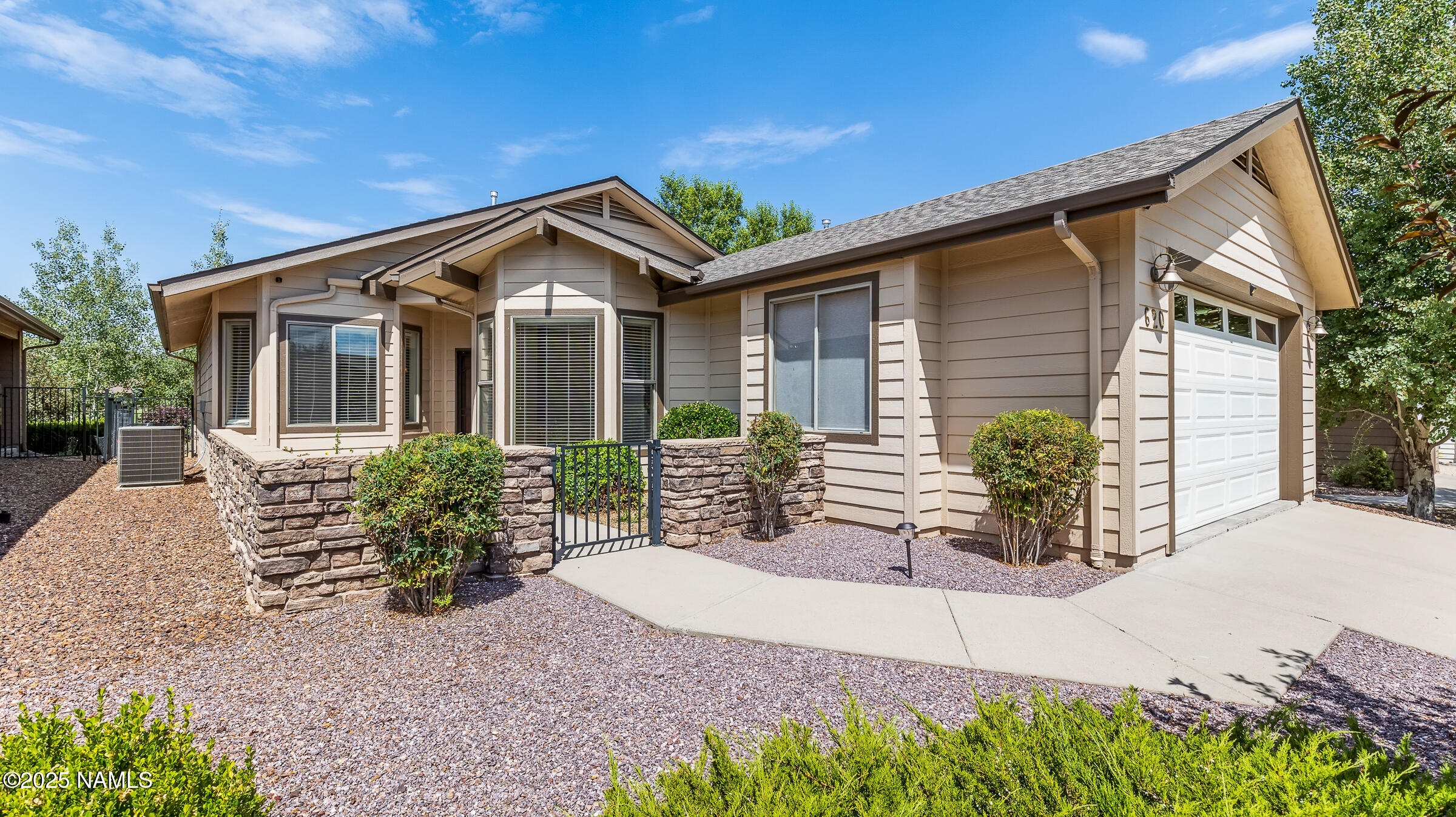 620 Brookline Loop Williams, AZ 86046 - Photo 30 of 38 a front view of house with yard and outdoor seating
