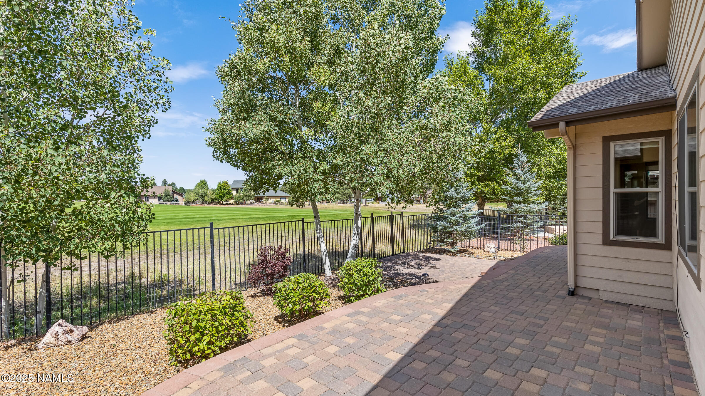 620 Brookline Loop Williams, AZ 86046 - Photo 33 of 38 a street view with a chair and table in the patio